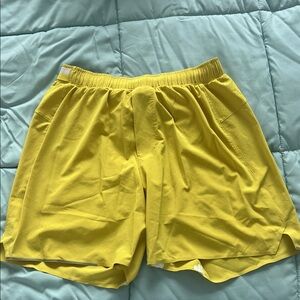 Lululemon Surge 4” Bright Yellow Athletic Shorts